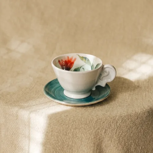 white-studio-hand-painted-cup-saucer